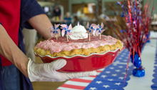 flag-decorated strawberry creme pie